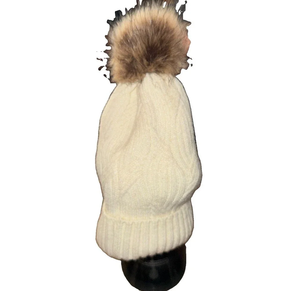 ZeroXposur women's cream knit beanies with a faux fur pom-pom